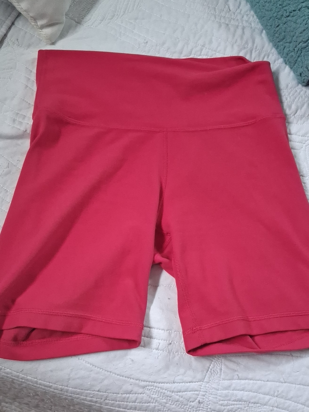 TNA High-Rise Bike Shorts in Bright Pink